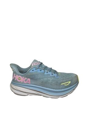 Hoka women’s Clifton 9 Light Blue Running Shoe with Pink Logo and Yellow Accents
